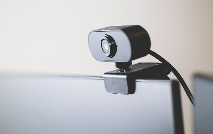 Closeup of a webcam on a computer monitor